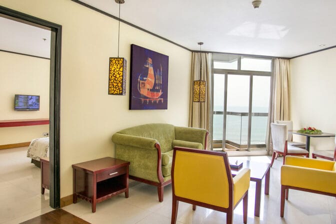Each room features a private balcony, allowing guests to unwind while soaking in the picturesque surroundings.